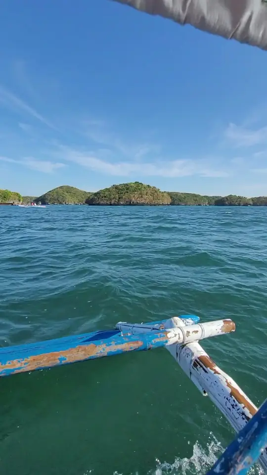 Point of view from the front of a boat crossing open water